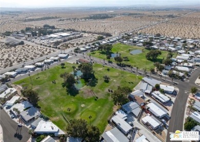 Located in a beautiful countryside setting at the entry to the on Desert Crest Country Club in California - for sale on GolfHomes.com, golf home, golf lot