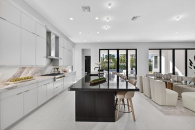 Set on an estate lot within Avenir's most luxurious gated on Palm Beach Gardens Golf Course in Florida - for sale on GolfHomes.com, golf home, golf lot