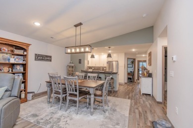 This end unit in The Dwellings has all the upgrades! One owner on Indian Hills Golf Club in Iowa - for sale on GolfHomes.com, golf home, golf lot