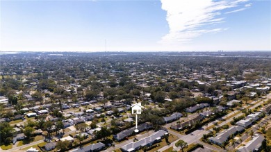 Nestled in the highly desirable 55+ community of Bardmoor, this on Bayou Golf Club in Florida - for sale on GolfHomes.com, golf home, golf lot