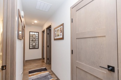 This end unit in The Dwellings has all the upgrades! One owner on Indian Hills Golf Club in Iowa - for sale on GolfHomes.com, golf home, golf lot