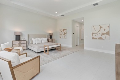 Set on an estate lot within Avenir's most luxurious gated on Palm Beach Gardens Golf Course in Florida - for sale on GolfHomes.com, golf home, golf lot