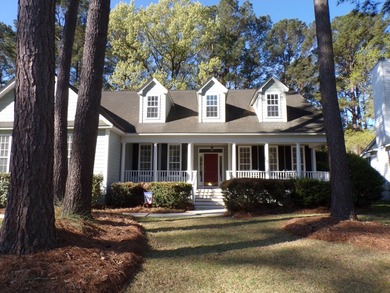 Nestled on the second tee of a premier golf course, this on Legend Oaks Plantation Golf Club in South Carolina - for sale on GolfHomes.com, golf home, golf lot