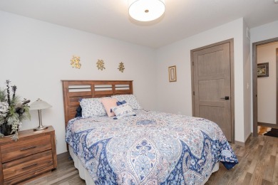This end unit in The Dwellings has all the upgrades! One owner on Indian Hills Golf Club in Iowa - for sale on GolfHomes.com, golf home, golf lot