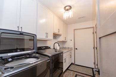 This end unit in The Dwellings has all the upgrades! One owner on Indian Hills Golf Club in Iowa - for sale on GolfHomes.com, golf home, golf lot