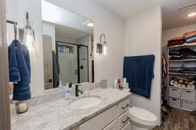 This end unit in The Dwellings has all the upgrades! One owner on Indian Hills Golf Club in Iowa - for sale on GolfHomes.com, golf home, golf lot