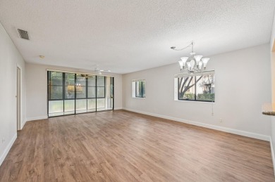 Amazing UPDATED MOVE-IN READY GROUND FLOOR END UNIT CONDO in PGA on PGA National Golf Club in Florida - for sale on GolfHomes.com, golf home, golf lot