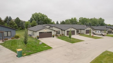 This end unit in The Dwellings has all the upgrades! One owner on Indian Hills Golf Club in Iowa - for sale on GolfHomes.com, golf home, golf lot