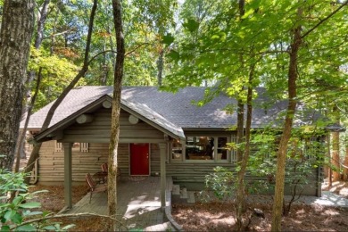 This is a light and bright, fully renovated, real log cabin in on Big Canoe Golf Club - Cherokee in Georgia - for sale on GolfHomes.com, golf home, golf lot