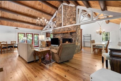This is a light and bright, fully renovated, real log cabin in on Big Canoe Golf Club - Cherokee in Georgia - for sale on GolfHomes.com, golf home, golf lot