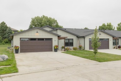 This end unit in The Dwellings has all the upgrades! One owner on Indian Hills Golf Club in Iowa - for sale on GolfHomes.com, golf home, golf lot