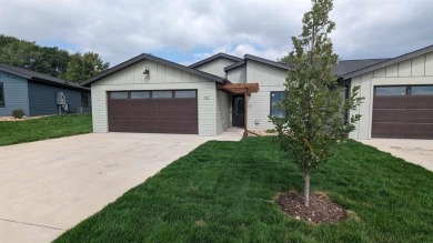 This end unit in The Dwellings has all the upgrades! One owner on Indian Hills Golf Club in Iowa - for sale on GolfHomes.com, golf home, golf lot