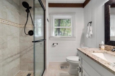This is a light and bright, fully renovated, real log cabin in on Big Canoe Golf Club - Cherokee in Georgia - for sale on GolfHomes.com, golf home, golf lot