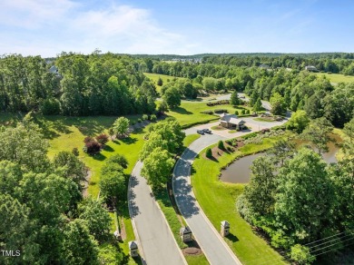 Welcome to refined living in the prestigious Legacy at Jordan on The Preserve At Jordan Lake Golf Club in North Carolina - for sale on GolfHomes.com, golf home, golf lot