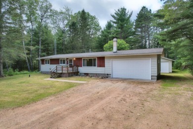 Explore a meticulously maintained 3-bedroom, 1.5-bathroom home on Plum Lake Golf Club in Wisconsin - for sale on GolfHomes.com, golf home, golf lot