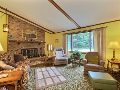 Explore a meticulously maintained 3-bedroom, 1.5-bathroom home on Plum Lake Golf Club in Wisconsin - for sale on GolfHomes.com, golf home, golf lot