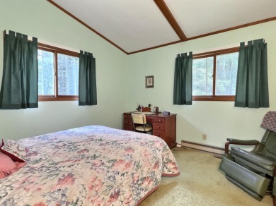 Explore a meticulously maintained 3-bedroom, 1.5-bathroom home on Plum Lake Golf Club in Wisconsin - for sale on GolfHomes.com, golf home, golf lot