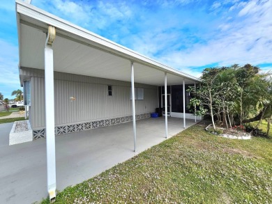 HUGE INCENTIVE, ALL LOT RENT WILL BE PAID THRU THE END OF THE on Riverbend Golf and Country Club in Florida - for sale on GolfHomes.com, golf home, golf lot