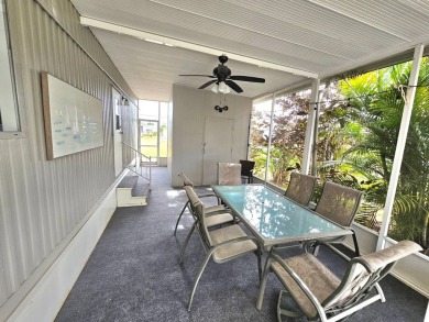 HUGE INCENTIVE, ALL LOT RENT WILL BE PAID THRU THE END OF THE on Riverbend Golf and Country Club in Florida - for sale on GolfHomes.com, golf home, golf lot