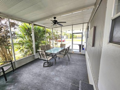 HUGE INCENTIVE, ALL LOT RENT WILL BE PAID THRU THE END OF THE on Riverbend Golf and Country Club in Florida - for sale on GolfHomes.com, golf home, golf lot