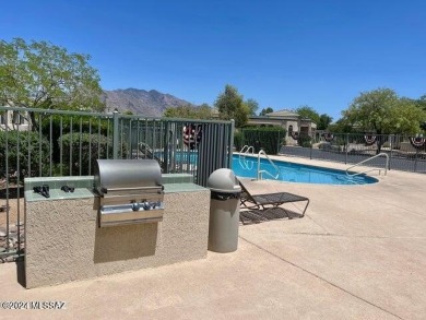 An Absolutely beautiful home.  This one shows like a model on Omni Tucson National Golf Resort and Spa - Catalina in Arizona - for sale on GolfHomes.com, golf home, golf lot