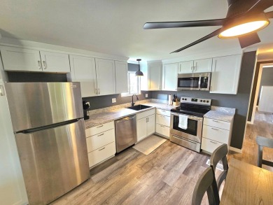 HUGE INCENTIVE, ALL LOT RENT WILL BE PAID THRU THE END OF THE on Riverbend Golf and Country Club in Florida - for sale on GolfHomes.com, golf home, golf lot