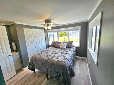 HUGE INCENTIVE, ALL LOT RENT WILL BE PAID THRU THE END OF THE on Riverbend Golf and Country Club in Florida - for sale on GolfHomes.com, golf home, golf lot