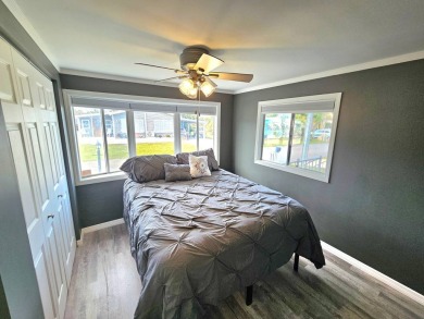 HUGE INCENTIVE, ALL LOT RENT WILL BE PAID THRU THE END OF THE on Riverbend Golf and Country Club in Florida - for sale on GolfHomes.com, golf home, golf lot