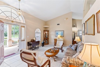 Welcome to this beautifully maintained 3 bedroom, 2 bath pool on The Grand Club Cypress Course in Florida - for sale on GolfHomes.com, golf home, golf lot