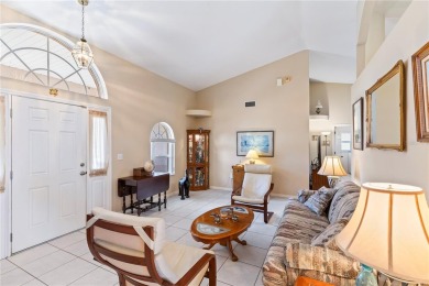 Welcome to this beautifully maintained 3 bedroom, 2 bath pool on The Grand Club Cypress Course in Florida - for sale on GolfHomes.com, golf home, golf lot