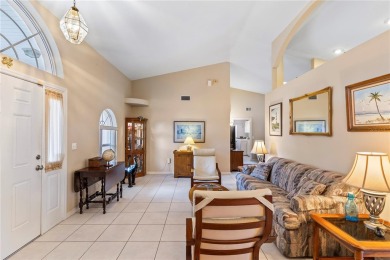Welcome to this beautifully maintained 3 bedroom, 2 bath pool on The Grand Club Cypress Course in Florida - for sale on GolfHomes.com, golf home, golf lot