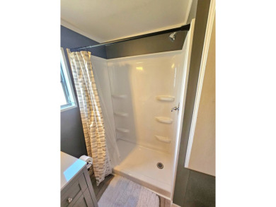 HUGE INCENTIVE, ALL LOT RENT WILL BE PAID THRU THE END OF THE on Riverbend Golf and Country Club in Florida - for sale on GolfHomes.com, golf home, golf lot