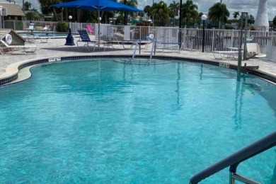 HUGE INCENTIVE, ALL LOT RENT WILL BE PAID THRU THE END OF THE on Riverbend Golf and Country Club in Florida - for sale on GolfHomes.com, golf home, golf lot