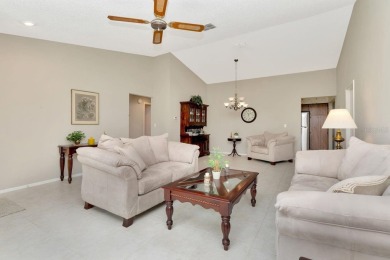 Stunning 2/2 home with a 2-car garage in a vibrant 55+ community on Highland Lakes Executive Golf Course in Florida - for sale on GolfHomes.com, golf home, golf lot