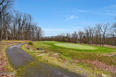 Welcome to your dream home nestled on a picturesque level lot on Paupack Hills Golf and Country Club in Pennsylvania - for sale on GolfHomes.com, golf home, golf lot