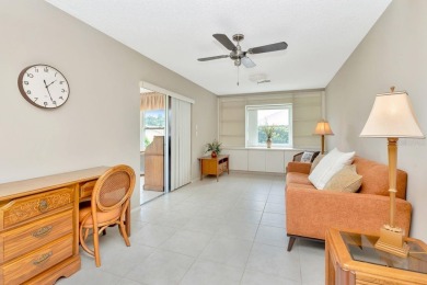 Stunning 2/2 home with a 2-car garage in a vibrant 55+ community on Highland Lakes Executive Golf Course in Florida - for sale on GolfHomes.com, golf home, golf lot