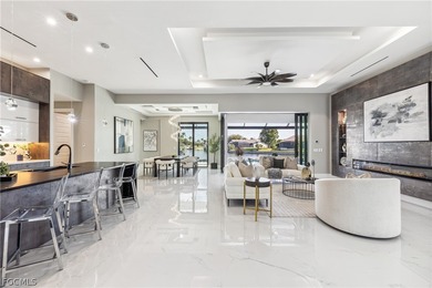 Welcome to a stunning new construction home perfectly positioned on Royal Tee Country Club in Florida - for sale on GolfHomes.com, golf home, golf lot