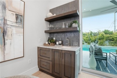 This coastal contemporary located exactly 1 mile to the beach in on Hole in the Wall Golf Club in Florida - for sale on GolfHomes.com, golf home, golf lot