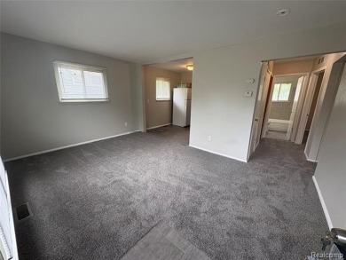 This charming and updated 2-bedroom, 1-bath ranch is move-in on The Links At Crystal Lake in Michigan - for sale on GolfHomes.com, golf home, golf lot