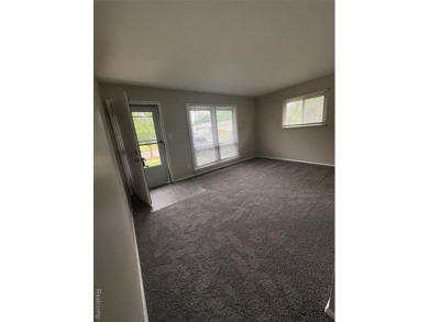 This charming and updated 2-bedroom, 1-bath ranch is move-in on The Links At Crystal Lake in Michigan - for sale on GolfHomes.com, golf home, golf lot