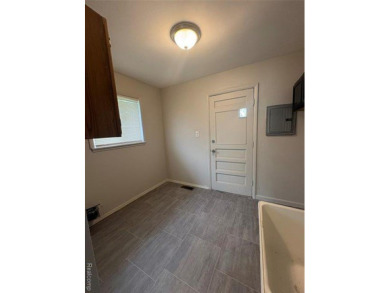 This charming and updated 2-bedroom, 1-bath ranch is move-in on The Links At Crystal Lake in Michigan - for sale on GolfHomes.com, golf home, golf lot