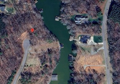 Beautiful wooded waterfront lot located in Lakewatch Plantation on Westlake Golf and Country Club in Virginia - for sale on GolfHomes.com, golf home, golf lot