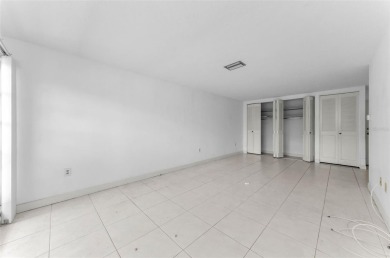 Location, location! Ground floor unit right by the pool & rec on The Dunedin Country Club in Florida - for sale on GolfHomes.com, golf home, golf lot