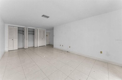 Location, location! Ground floor unit right by the pool & rec on The Dunedin Country Club in Florida - for sale on GolfHomes.com, golf home, golf lot