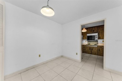 Location, location! Ground floor unit right by the pool & rec on The Dunedin Country Club in Florida - for sale on GolfHomes.com, golf home, golf lot