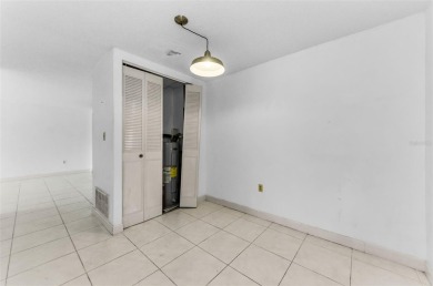Location, location! Ground floor unit right by the pool & rec on The Dunedin Country Club in Florida - for sale on GolfHomes.com, golf home, golf lot