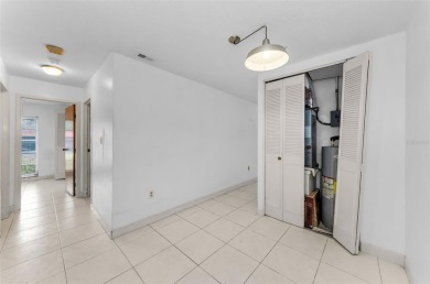 Location, location! Ground floor unit right by the pool & rec on The Dunedin Country Club in Florida - for sale on GolfHomes.com, golf home, golf lot