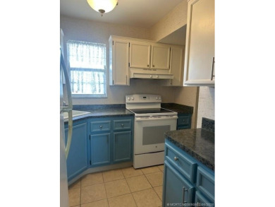 Centrally located on the 2nd floor overlooking the beautifully on Monterey Yacht and Country Club in Florida - for sale on GolfHomes.com, golf home, golf lot
