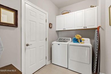 Privacy abounds, ease of maintenance-free living and convenience on Members Club At St. James Plantation in North Carolina - for sale on GolfHomes.com, golf home, golf lot