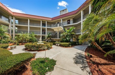 Location, location! Ground floor unit right by the pool & rec on The Dunedin Country Club in Florida - for sale on GolfHomes.com, golf home, golf lot